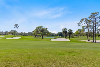 Welcome to your new home in the guard-gated Audubon condominium on Feather Sound Country Club in Florida - for sale on GolfHomes.com, golf home, golf lot