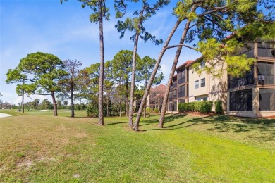 Welcome to your new home in the guard-gated Audubon condominium on Feather Sound Country Club in Florida - for sale on GolfHomes.com, golf home, golf lot