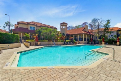 Welcome to your new home in the guard-gated Audubon condominium on Feather Sound Country Club in Florida - for sale on GolfHomes.com, golf home, golf lot