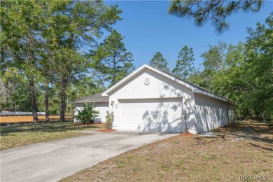 Welcome to this stunning split-floor home in the heart of on Sugarmill Woods Golf and Country Club in Florida - for sale on GolfHomes.com, golf home, golf lot