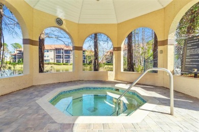 Welcome to your new home in the guard-gated Audubon condominium on Feather Sound Country Club in Florida - for sale on GolfHomes.com, golf home, golf lot