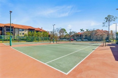 Welcome to your new home in the guard-gated Audubon condominium on Feather Sound Country Club in Florida - for sale on GolfHomes.com, golf home, golf lot