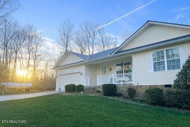Discover this nicely maintained home on a combined double lot on Lake Tansi Village Country Club in Tennessee - for sale on GolfHomes.com, golf home, golf lot