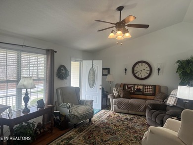 Discover this nicely maintained home on a combined double lot on Lake Tansi Village Country Club in Tennessee - for sale on GolfHomes.com, golf home, golf lot