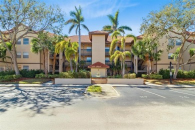 Welcome to your new home in the guard-gated Audubon condominium on Feather Sound Country Club in Florida - for sale on GolfHomes.com, golf home, golf lot