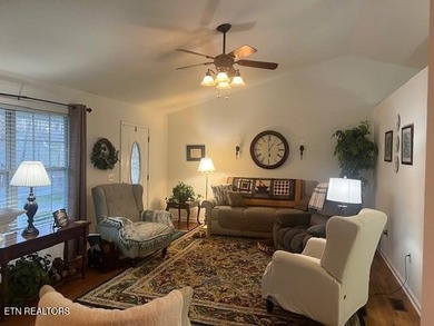 Discover this nicely maintained home on a combined double lot on Lake Tansi Village Country Club in Tennessee - for sale on GolfHomes.com, golf home, golf lot