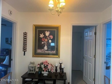 Discover this nicely maintained home on a combined double lot on Lake Tansi Village Country Club in Tennessee - for sale on GolfHomes.com, golf home, golf lot