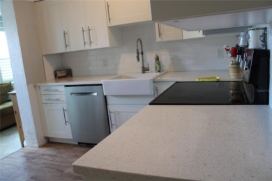 FIRST FLOOR GEM****A wonderfully updated condo that let's you on On Top Of The World Golf Course in Florida - for sale on GolfHomes.com, golf home, golf lot