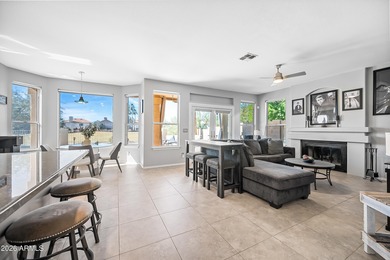 Stunning 4-bedroom, 3-bath home on the golf course in Ahwatukee on The Foothills Golf Club in Arizona - for sale on GolfHomes.com, golf home, golf lot