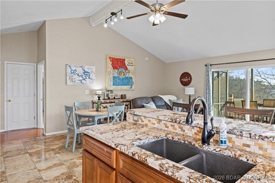 Welcome to the iconic Tan Tar A Estates, neighboring on The Oaks Golf Course in Missouri - for sale on GolfHomes.com, golf home, golf lot