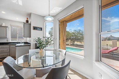 Stunning 4-bedroom, 3-bath home on the golf course in Ahwatukee on The Foothills Golf Club in Arizona - for sale on GolfHomes.com, golf home, golf lot