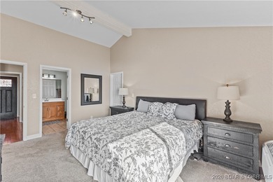 Welcome to the iconic Tan Tar A Estates, neighboring on The Oaks Golf Course in Missouri - for sale on GolfHomes.com, golf home, golf lot