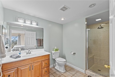 Welcome to the iconic Tan Tar A Estates, neighboring on The Oaks Golf Course in Missouri - for sale on GolfHomes.com, golf home, golf lot