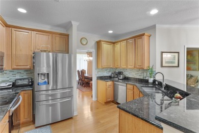 Discover this beautifully maintained 2005 custom-built residence on Turkey Creek Golf and Country Club in Florida - for sale on GolfHomes.com, golf home, golf lot
