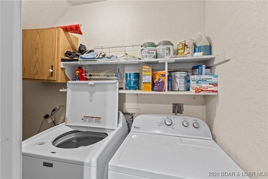 Welcome to the iconic Tan Tar A Estates, neighboring on The Oaks Golf Course in Missouri - for sale on GolfHomes.com, golf home, golf lot