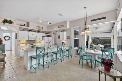 Beautiful low maintenance POOL home with WHOLE HOME SOLAR POWER on Plantation Bay Golf and Country Club in Florida - for sale on GolfHomes.com, golf home, golf lot