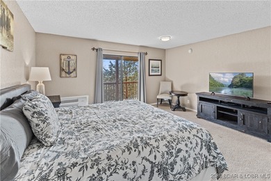 Welcome to the iconic Tan Tar A Estates, neighboring on The Oaks Golf Course in Missouri - for sale on GolfHomes.com, golf home, golf lot