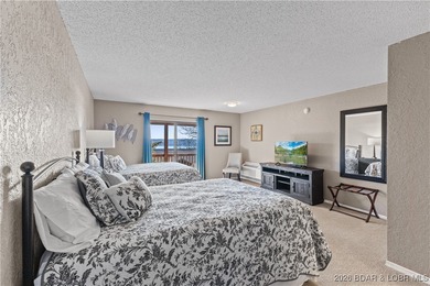 Welcome to the iconic Tan Tar A Estates, neighboring on The Oaks Golf Course in Missouri - for sale on GolfHomes.com, golf home, golf lot