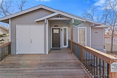 Welcome to the iconic Tan Tar A Estates, neighboring on The Oaks Golf Course in Missouri - for sale on GolfHomes.com, golf home, golf lot