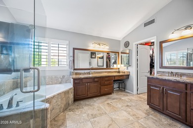 Stunning 4-bedroom, 3-bath home on the golf course in Ahwatukee on The Foothills Golf Club in Arizona - for sale on GolfHomes.com, golf home, golf lot