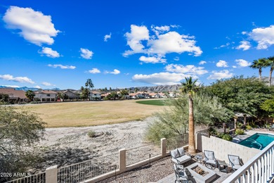 Stunning 4-bedroom, 3-bath home on the golf course in Ahwatukee on The Foothills Golf Club in Arizona - for sale on GolfHomes.com, golf home, golf lot