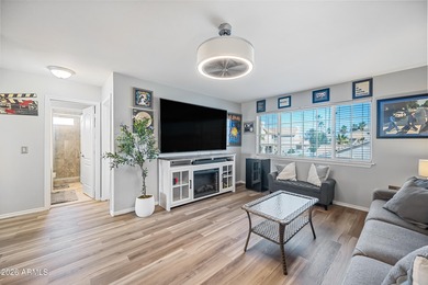 Stunning 4-bedroom, 3-bath home on the golf course in Ahwatukee on The Foothills Golf Club in Arizona - for sale on GolfHomes.com, golf home, golf lot