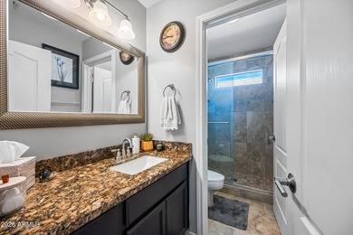 Stunning 4-bedroom, 3-bath home on the golf course in Ahwatukee on The Foothills Golf Club in Arizona - for sale on GolfHomes.com, golf home, golf lot