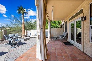 Stunning 4-bedroom, 3-bath home on the golf course in Ahwatukee on The Foothills Golf Club in Arizona - for sale on GolfHomes.com, golf home, golf lot