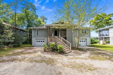Enjoy spectacular sunsets from nearly every room in this on Harbour Point Golf Club in North Carolina - for sale on GolfHomes.com, golf home, golf lot