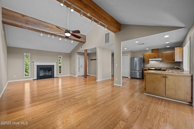 Enjoy spectacular sunsets from nearly every room in this on Harbour Point Golf Club in North Carolina - for sale on GolfHomes.com, golf home, golf lot