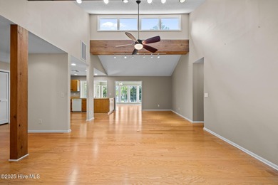 Enjoy spectacular sunsets from nearly every room in this on Harbour Point Golf Club in North Carolina - for sale on GolfHomes.com, golf home, golf lot