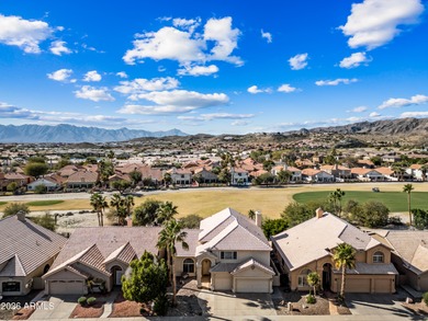 Stunning 4-bedroom, 3-bath home on the golf course in Ahwatukee on The Foothills Golf Club in Arizona - for sale on GolfHomes.com, golf home, golf lot