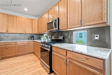 Beautiful ranch home backing to Antler Creek Golf Course with on Antler Creek Golf Course in Colorado - for sale on GolfHomes.com, golf home, golf lot