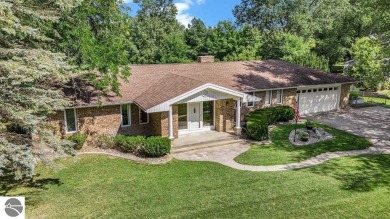Nestled along the lush greens of Hidden Oaks Golf Course, this on Hidden Oaks Golf Course in Michigan - for sale on GolfHomes.com, golf home, golf lot
