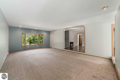 Nestled along the lush greens of Hidden Oaks Golf Course, this on Hidden Oaks Golf Course in Michigan - for sale on GolfHomes.com, golf home, golf lot