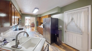 One Life to Live so start enjoying it now! This 3 BR, 2 1/2 bath on Boots Randolph Golf Course in Kentucky - for sale on GolfHomes.com, golf home, golf lot