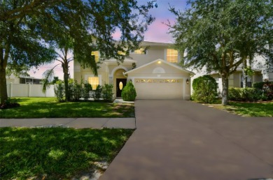 This 4 bedroom and 2.5 bath home has a great pond view, and is on Heritage Isles Golf and Country Club in Florida - for sale on GolfHomes.com, golf home, golf lot