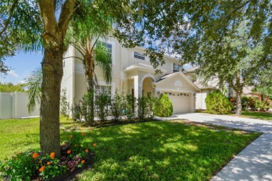 This 4 bedroom and 2.5 bath home has a great pond view, and is on Heritage Isles Golf and Country Club in Florida - for sale on GolfHomes.com, golf home, golf lot