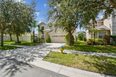 This 4 bedroom and 2.5 bath home has a great pond view, and is on Heritage Isles Golf and Country Club in Florida - for sale on GolfHomes.com, golf home, golf lot