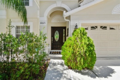 This 4 bedroom and 2.5 bath home has a great pond view, and is on Heritage Isles Golf and Country Club in Florida - for sale on GolfHomes.com, golf home, golf lot