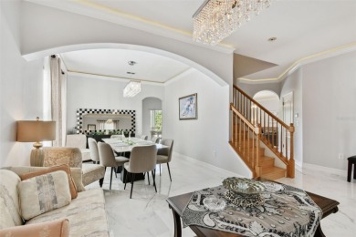 This 4 bedroom and 2.5 bath home has a great pond view, and is on Heritage Isles Golf and Country Club in Florida - for sale on GolfHomes.com, golf home, golf lot