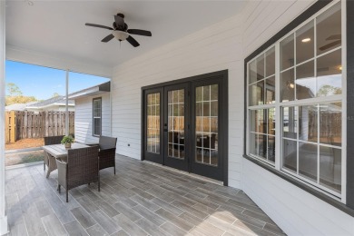 Step inside this beautifully updated 4-bedroom, 2.5-bathroom on Haile Plantation Golf and Country Club in Florida - for sale on GolfHomes.com, golf home, golf lot