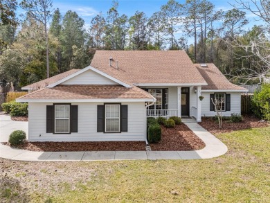Step inside this beautifully updated 4-bedroom, 2.5-bathroom on Haile Plantation Golf and Country Club in Florida - for sale on GolfHomes.com, golf home, golf lot