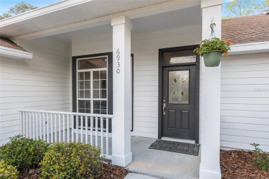 Step inside this beautifully updated 4-bedroom, 2.5-bathroom on Haile Plantation Golf and Country Club in Florida - for sale on GolfHomes.com, golf home, golf lot