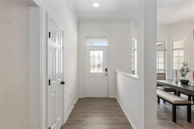Step inside this beautifully updated 4-bedroom, 2.5-bathroom on Haile Plantation Golf and Country Club in Florida - for sale on GolfHomes.com, golf home, golf lot
