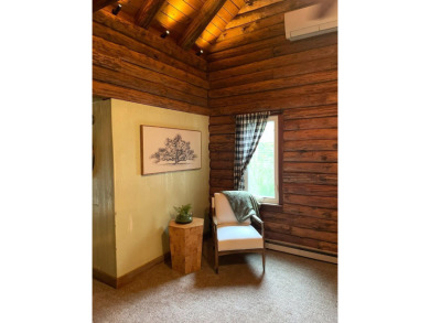 Welcome to this authentic Cape Cod-style log cabin in the heart on Apple Valley Golf Course in Ohio - for sale on GolfHomes.com, golf home, golf lot