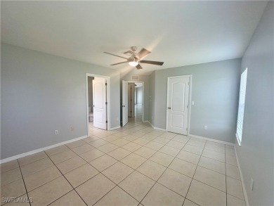 Dreaming of Southwest Florida living? Check out this move-in on Palmetto-Pine Country Club in Florida - for sale on GolfHomes.com, golf home, golf lot