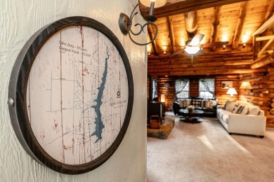 Welcome to this authentic Cape Cod-style log cabin in the heart on Apple Valley Golf Course in Ohio - for sale on GolfHomes.com, golf home, golf lot