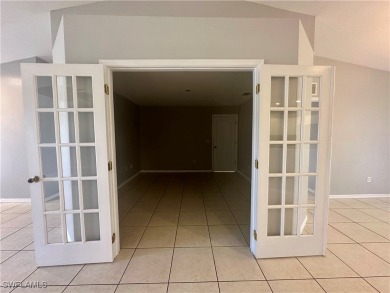 Dreaming of Southwest Florida living? Check out this move-in on Palmetto-Pine Country Club in Florida - for sale on GolfHomes.com, golf home, golf lot