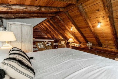 Welcome to this authentic Cape Cod-style log cabin in the heart on Apple Valley Golf Course in Ohio - for sale on GolfHomes.com, golf home, golf lot